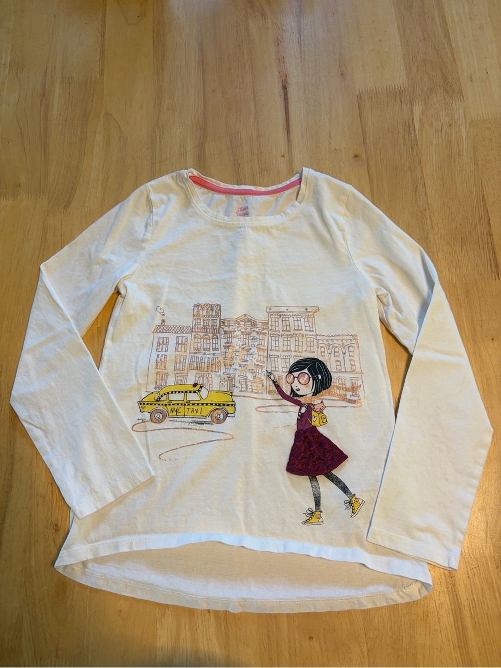Girls' White Long-Sleeve Graphic Tee with Yellow Taxi Detail